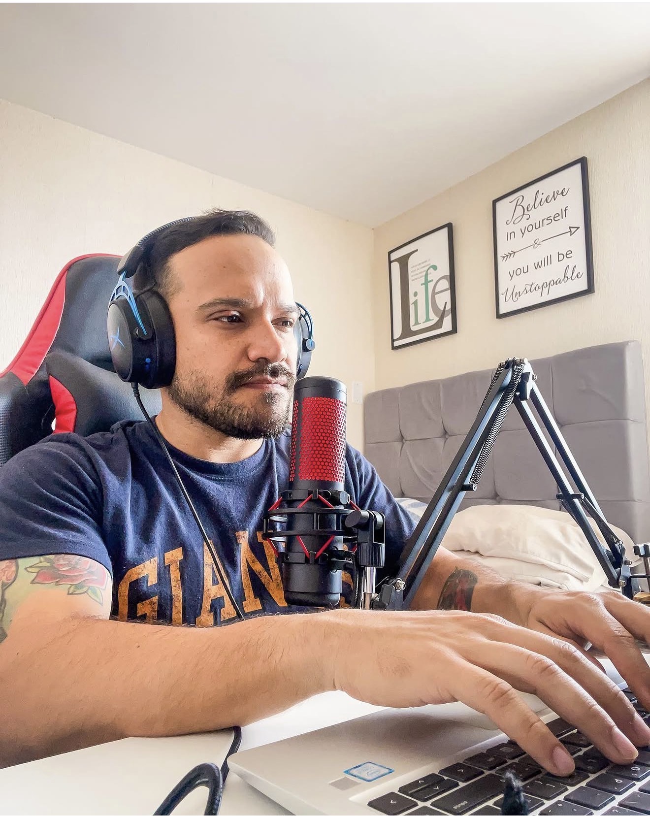 Yetro recording a podcast from a home setup